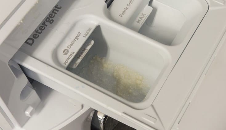 Остатки порошка в лотке